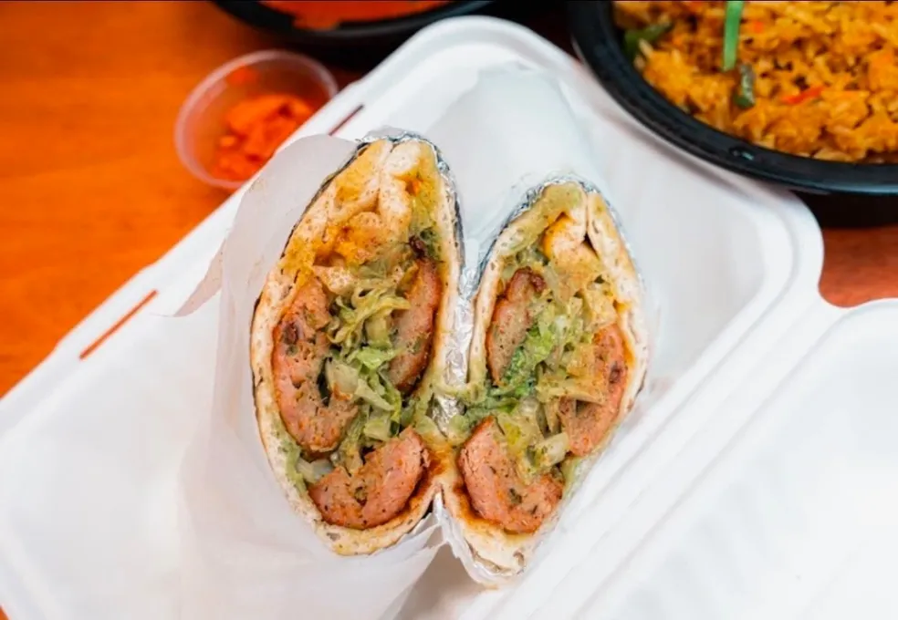 Open Indian wrap in a takeout container